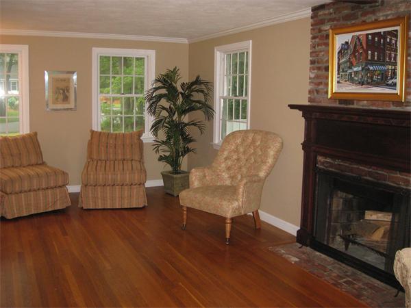 16 Whippletree Road Chelmsford, MA 01824 - Photo 4 of 22 a living room with furniture and a fireplace