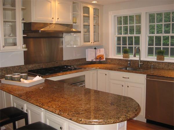 16 Whippletree Road Chelmsford, MA 01824 - Photo 6 of 22 a kitchen with granite countertop a sink a stove and a granite counter tops