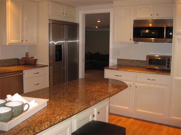16 Whippletree Road Chelmsford, MA 01824 - Photo 7 of 22 a kitchen with stainless steel appliances granite countertop a sink and a microwave