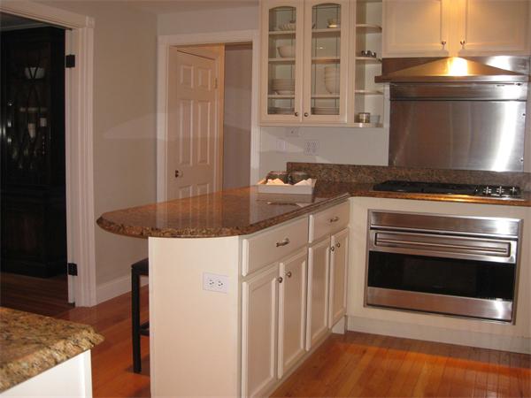 16 Whippletree Road Chelmsford, MA 01824 - Photo 8 of 22 a kitchen with granite countertop a stove and a sink
