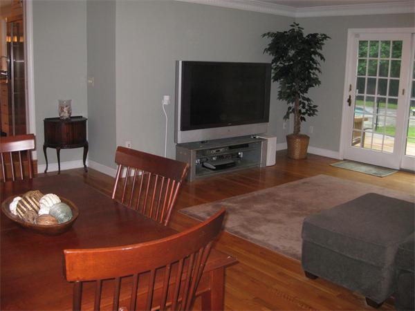 16 Whippletree Road Chelmsford, MA 01824 - Photo 9 of 22 a living room with furniture and a flat screen tv