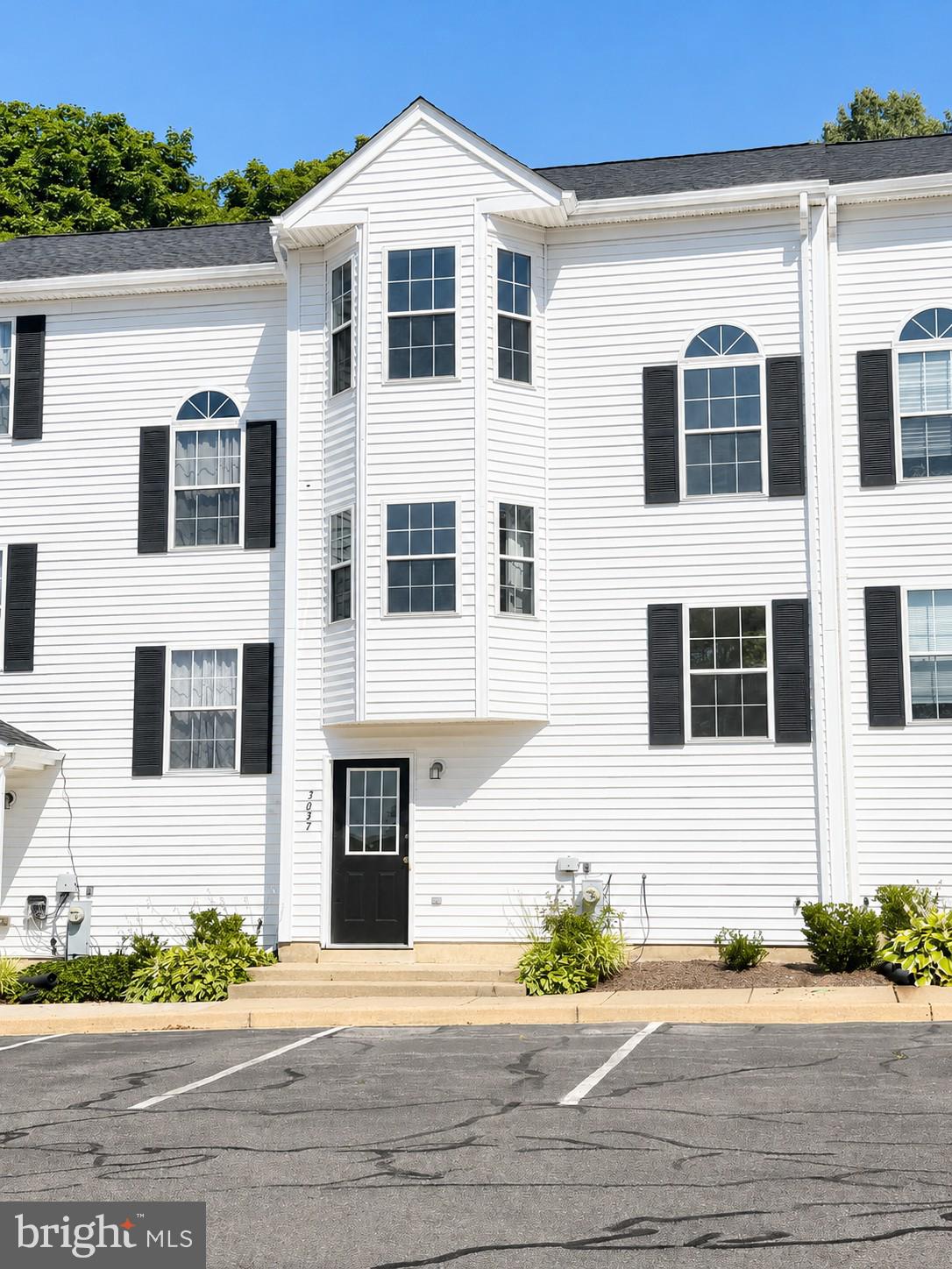 3637 Harbor Road Chesapeake Beach, MD 20732 - Photo 1 of 9 Charming white facade with classic details.