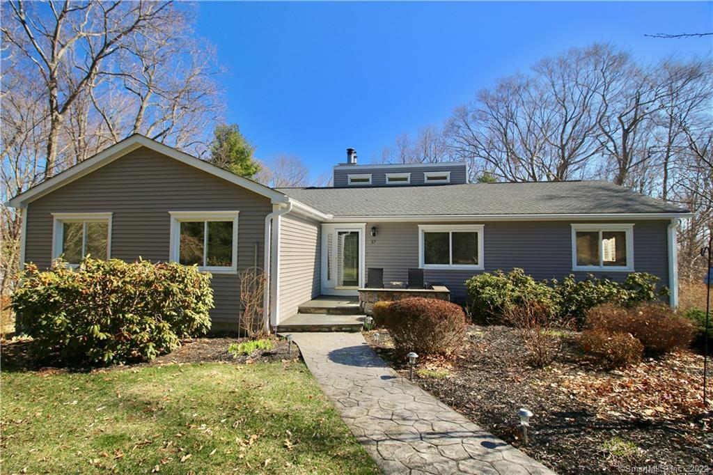 17 Davis Road Seymour, CT 06483 - Photo 1 of 1 a front view of house with yard and outdoor seating