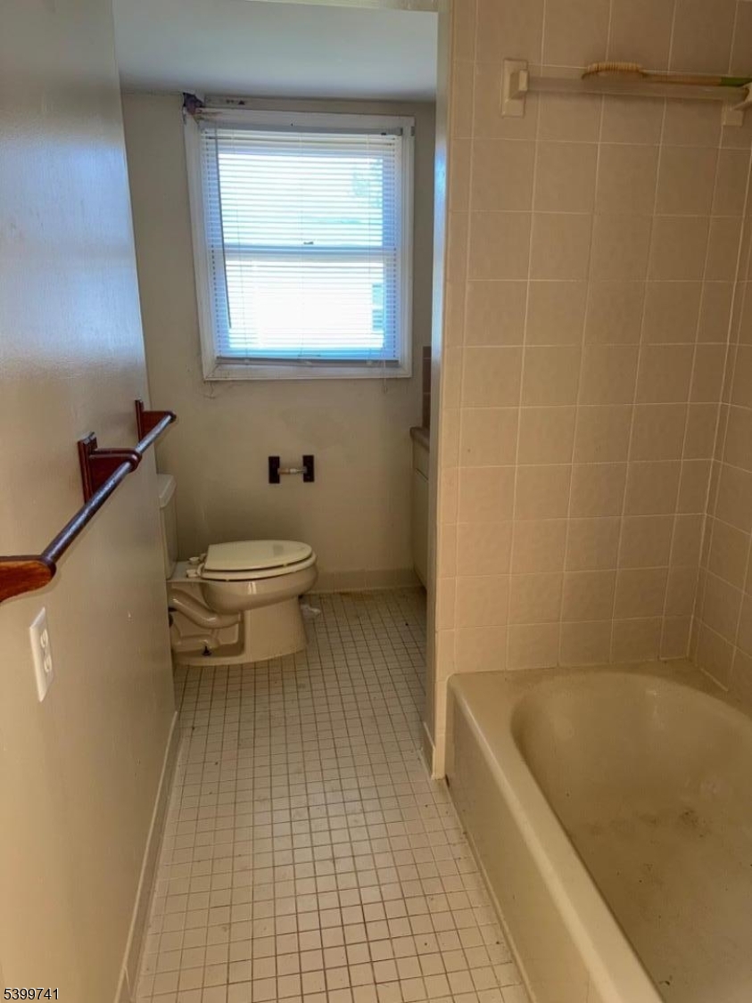 6 Maple Lane Hampton, NJ 08827 - Photo 5 of 13 a bathroom with a sink a toilet and bathtub