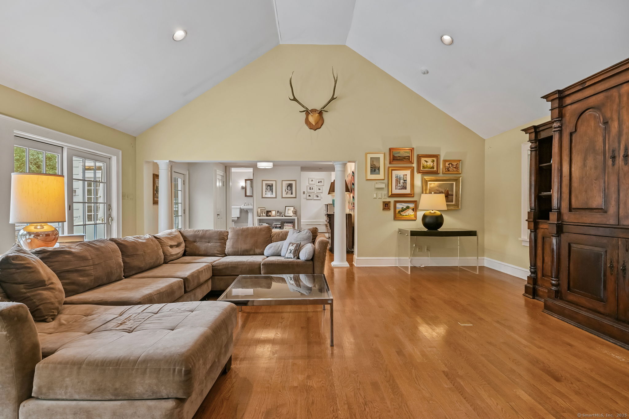 330 Ridgefield Road Wilton, CT 06897 - Photo 17 of 40 a living room with furniture and a flat screen tv