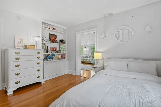 a bedroom with a bed and a closet