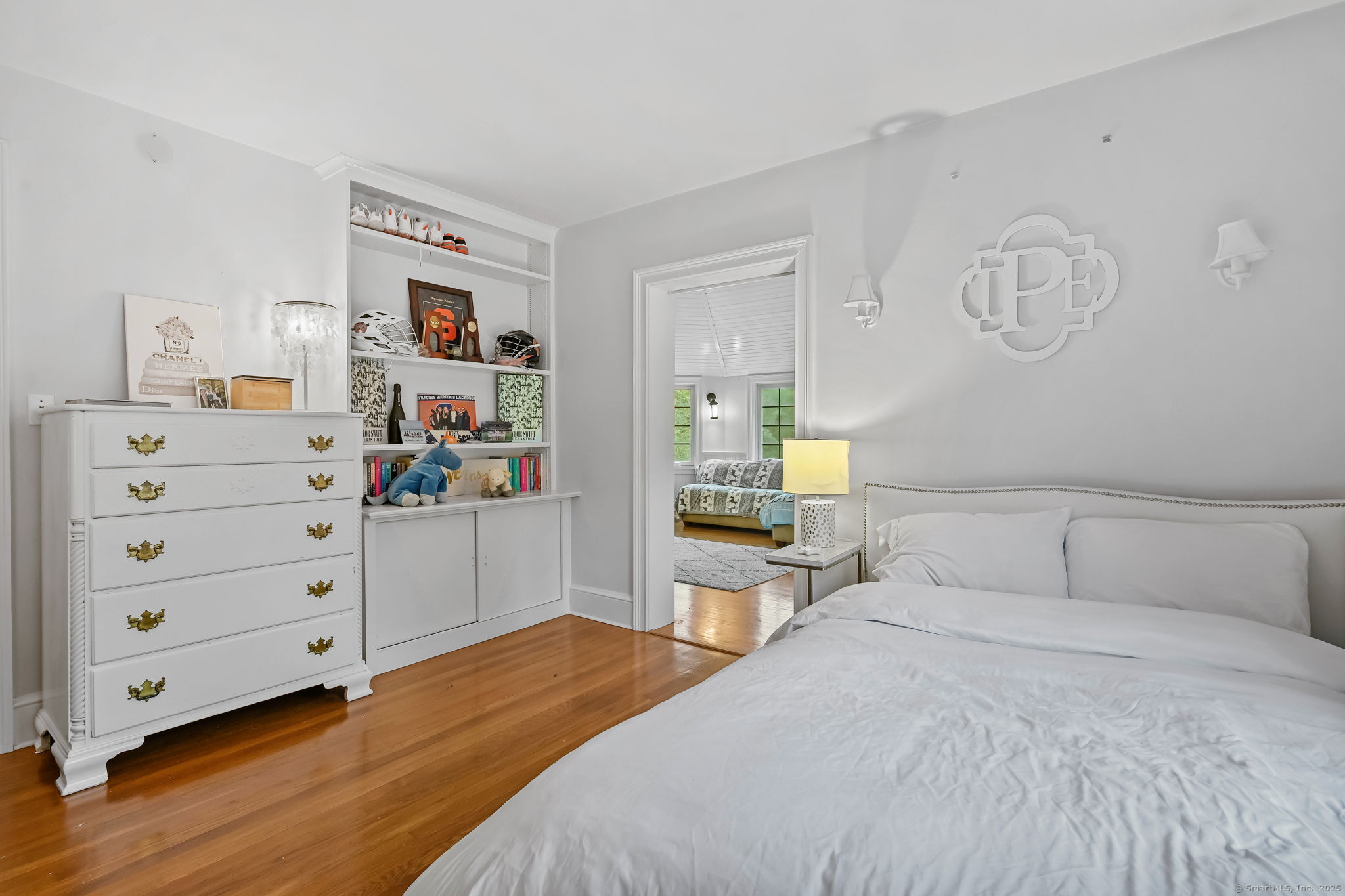 330 Ridgefield Road Wilton, CT 06897 - Photo 28 of 40 a bedroom with a bed and a closet