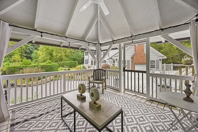 a view of a chairs on the roof deck