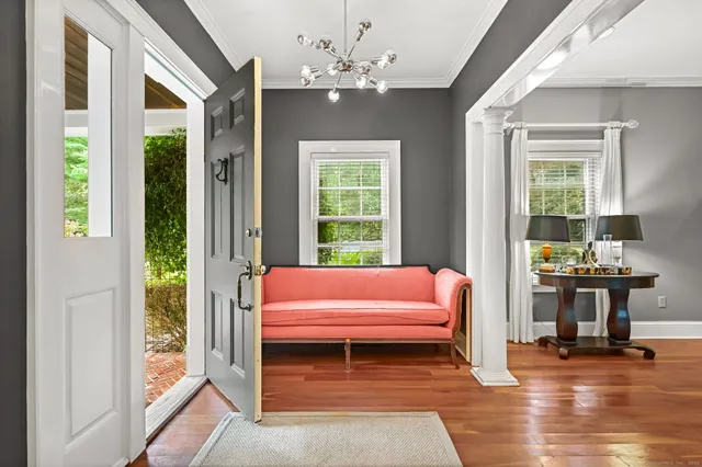 a living room with furniture and a window