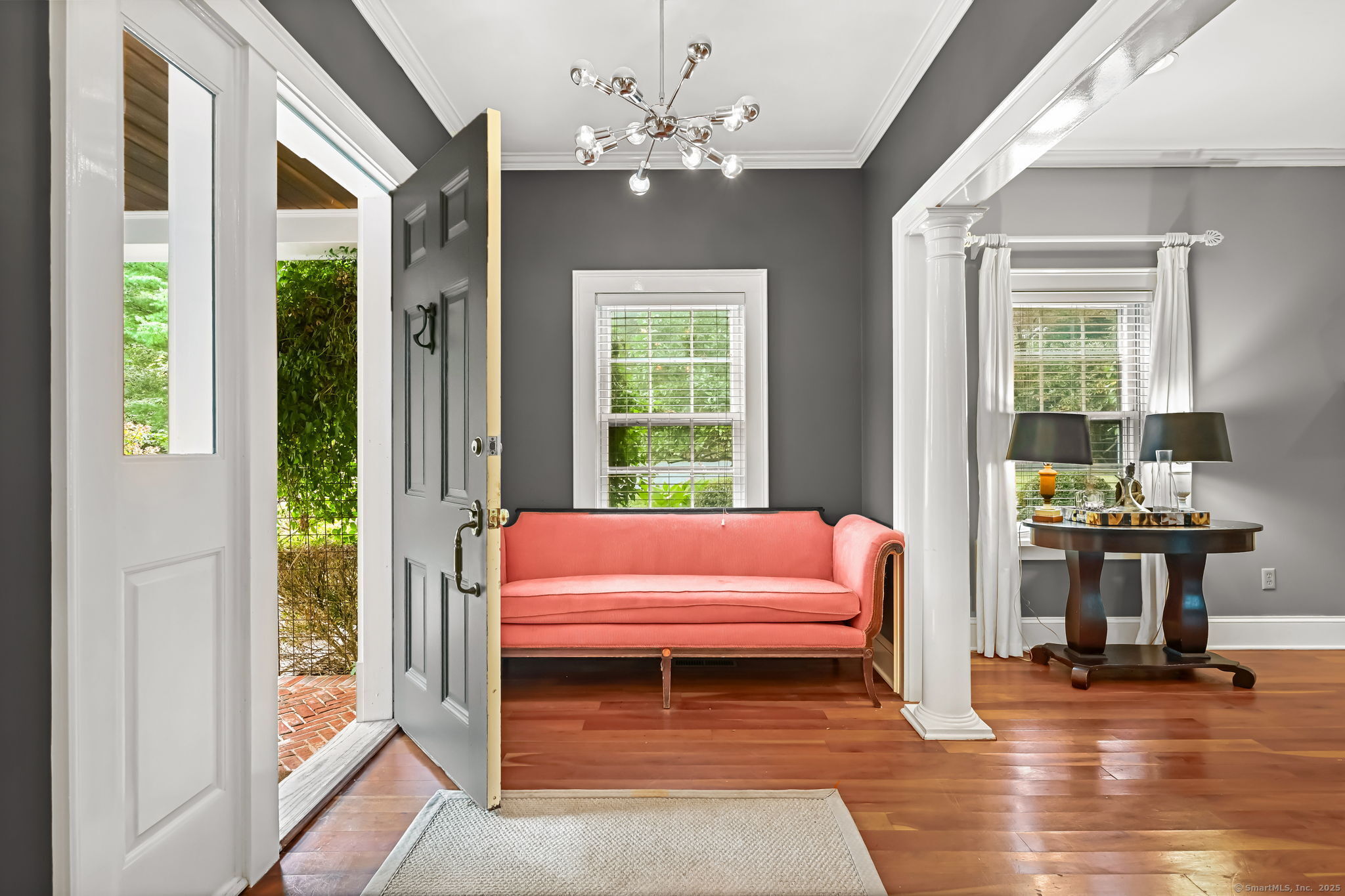 330 Ridgefield Road Wilton, CT 06897 - Photo 5 of 40 a living room with furniture and a window