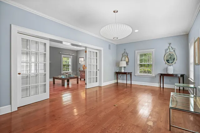 a living room with furniture and a table