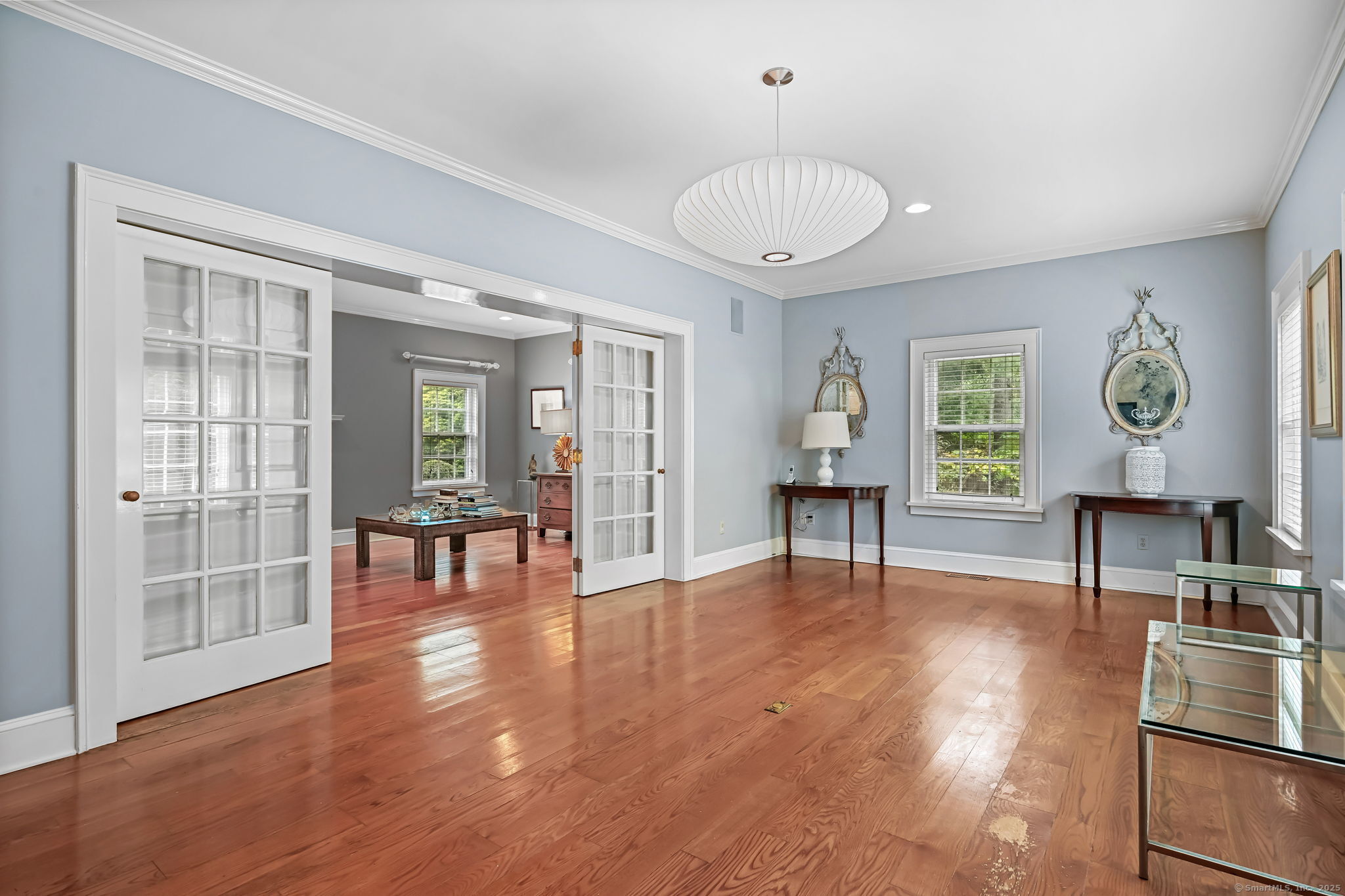 330 Ridgefield Road Wilton, CT 06897 - Photo 8 of 40 a living room with furniture and a table