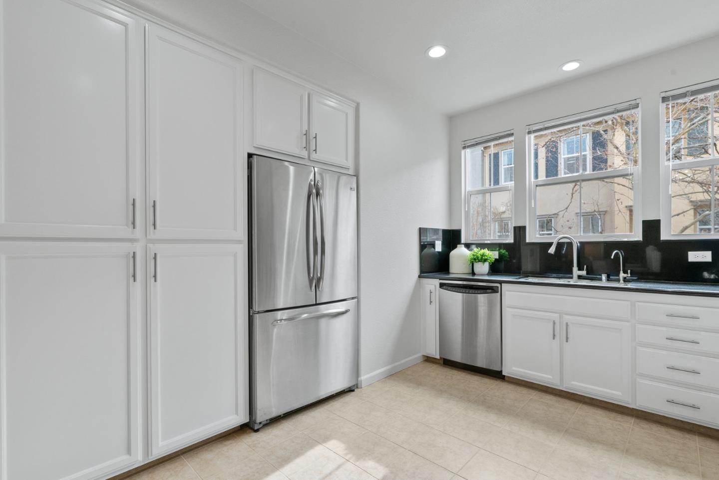 1520 Avina Circle, Unit 2 Santa Clara, CA 95054 - Photo 14 of 39 a kitchen with stainless steel appliances granite countertop a refrigerator a sink and a stove