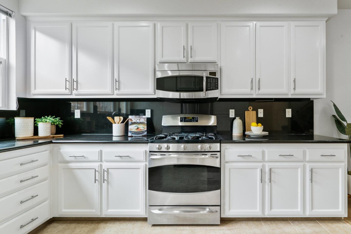 1520 Avina Circle, Unit 2 Santa Clara, CA 95054 - Photo 15 of 39 a kitchen with white cabinets and appliances