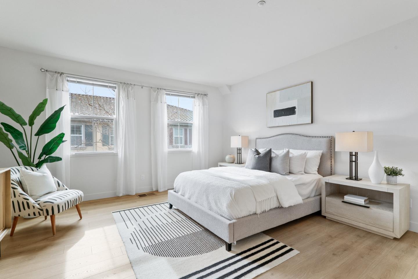 1520 Avina Circle, Unit 2 Santa Clara, CA 95054 - Photo 20 of 39 a bedroom with a bed and a chair