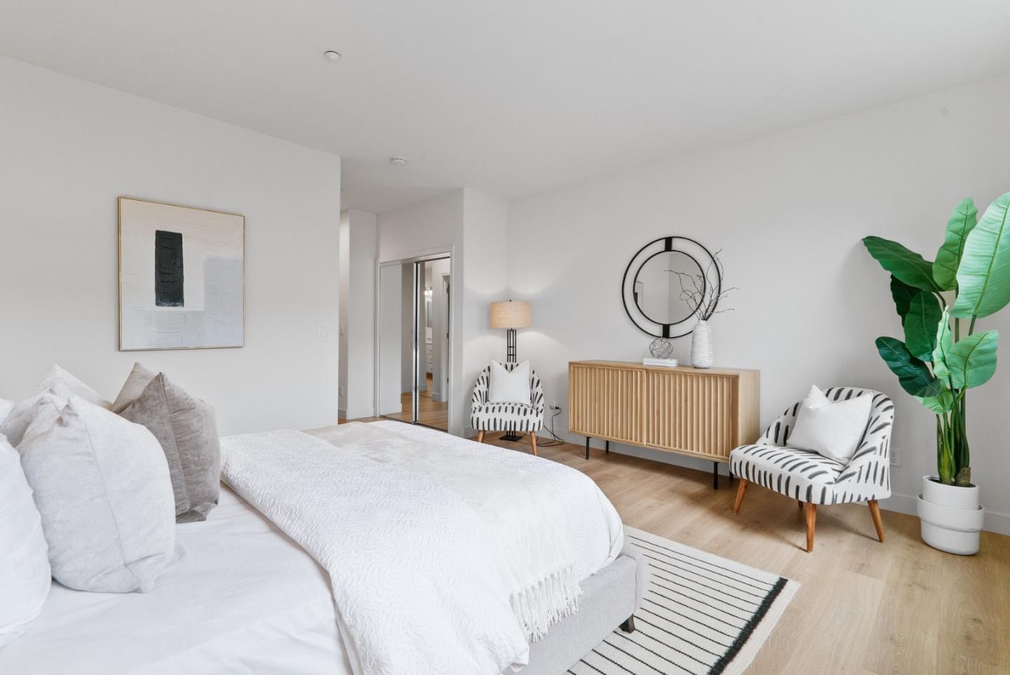 1520 Avina Circle, Unit 2 Santa Clara, CA 95054 - Photo 23 of 39 a bedroom with bed and a potted plant