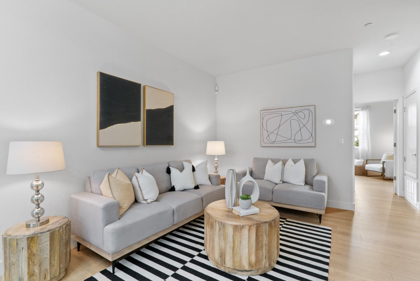 1520 Avina Circle, Unit 2 Santa Clara, CA 95054 - Photo 3 of 39 a living room with furniture and a wooden floor