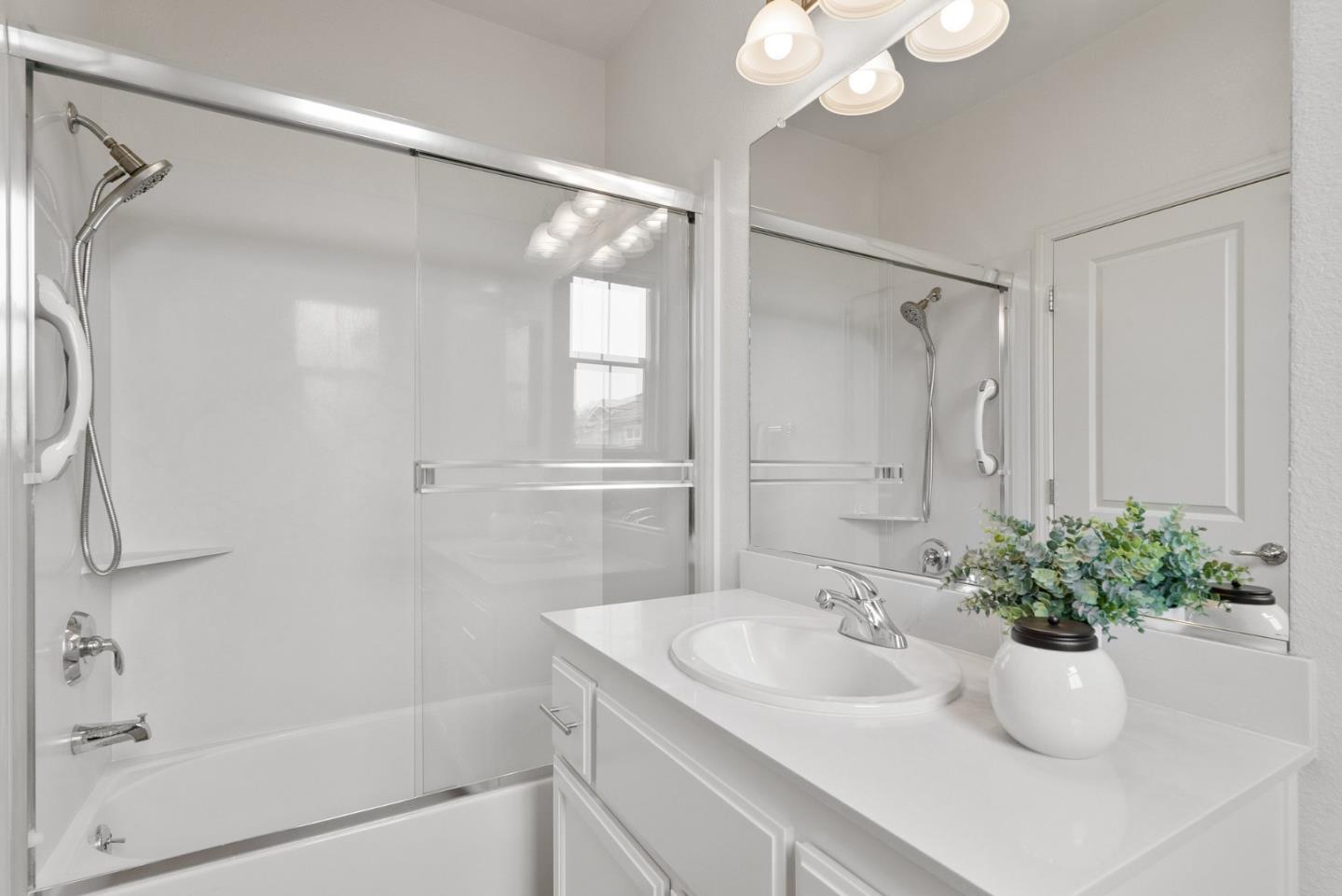 1520 Avina Circle, Unit 2 Santa Clara, CA 95054 - Photo 31 of 39 a bathroom with a sink shower and a mirror