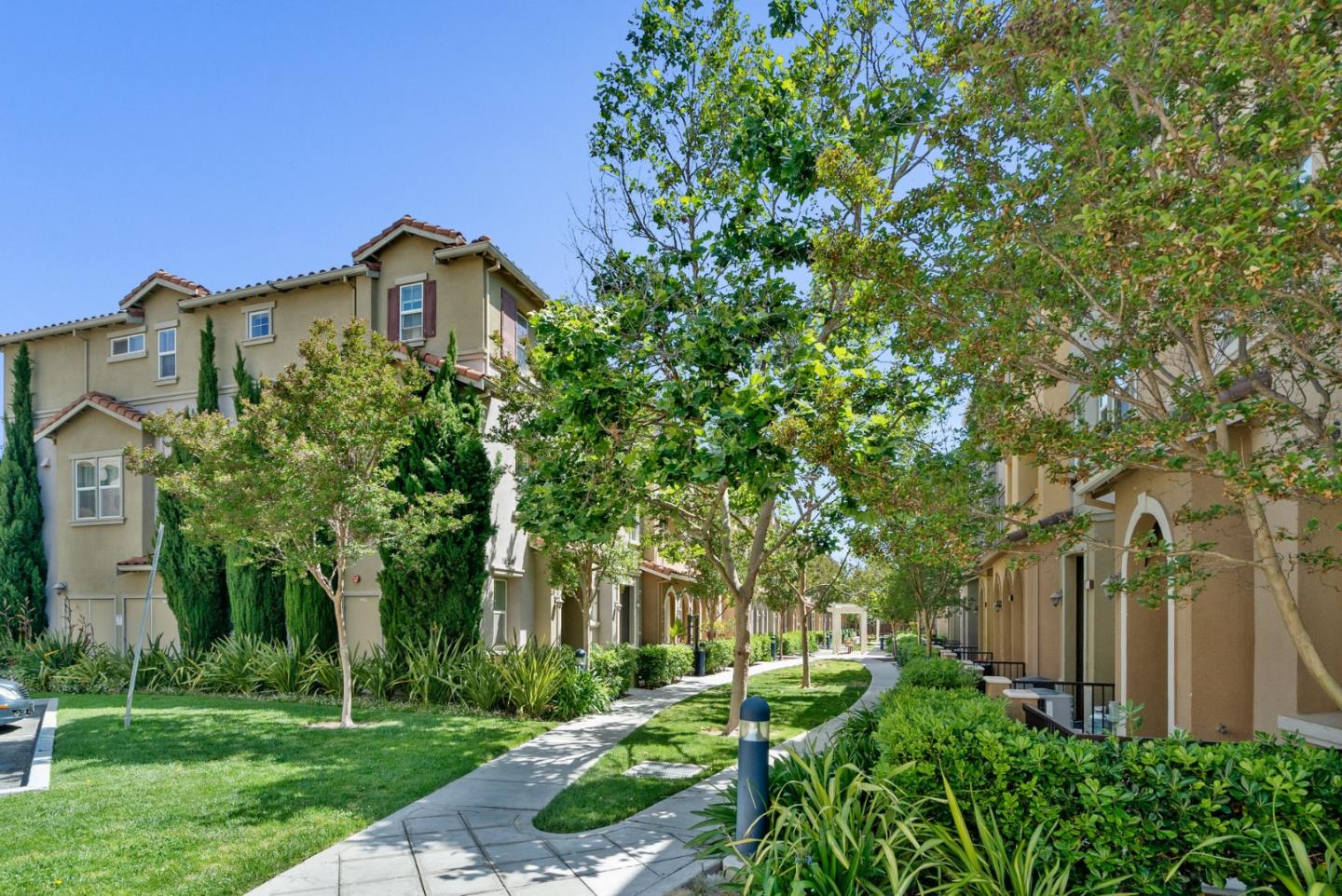 1520 Avina Circle, Unit 2 Santa Clara, CA 95054 - Photo 34 of 39 a front view of a house with garden