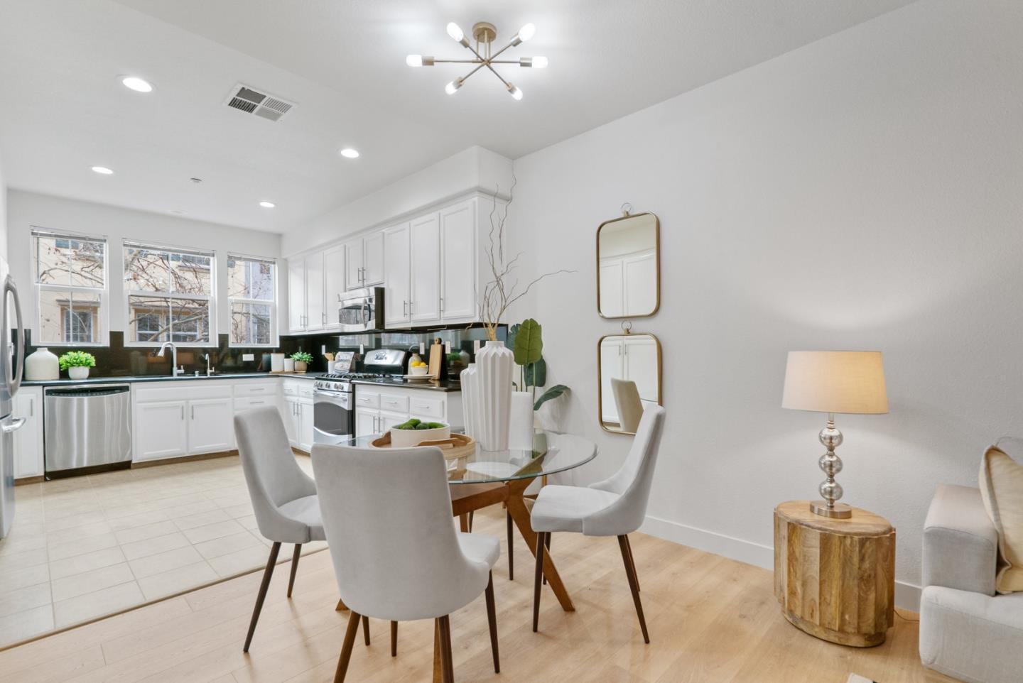 1520 Avina Circle, Unit 2 Santa Clara, CA 95054 - Photo 10 of 39 a dining room with furniture and chandelier