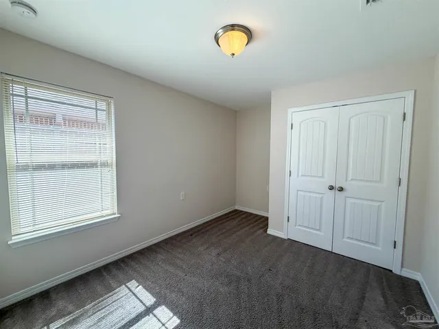 a view of an empty room with window