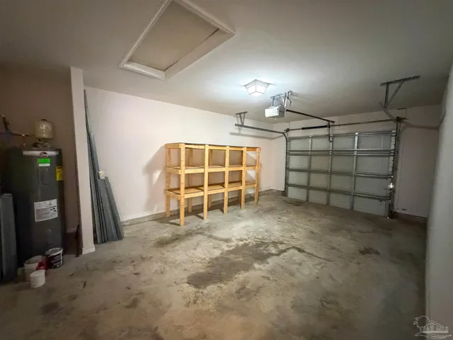 a view of backyard with tub