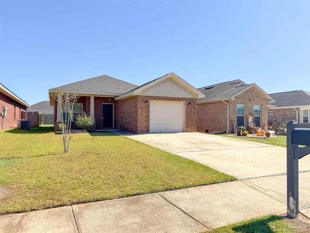 a house with swimming pool in front of it