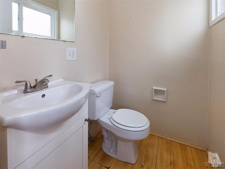 2542 Poli Street Ventura, CA 93003 - Photo 11 of 14 a bathroom with a sink and a toilet