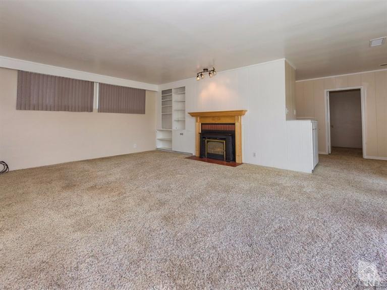 2542 Poli Street Ventura, CA 93003 - Photo 7 of 14 a view of empty room with a fireplace
