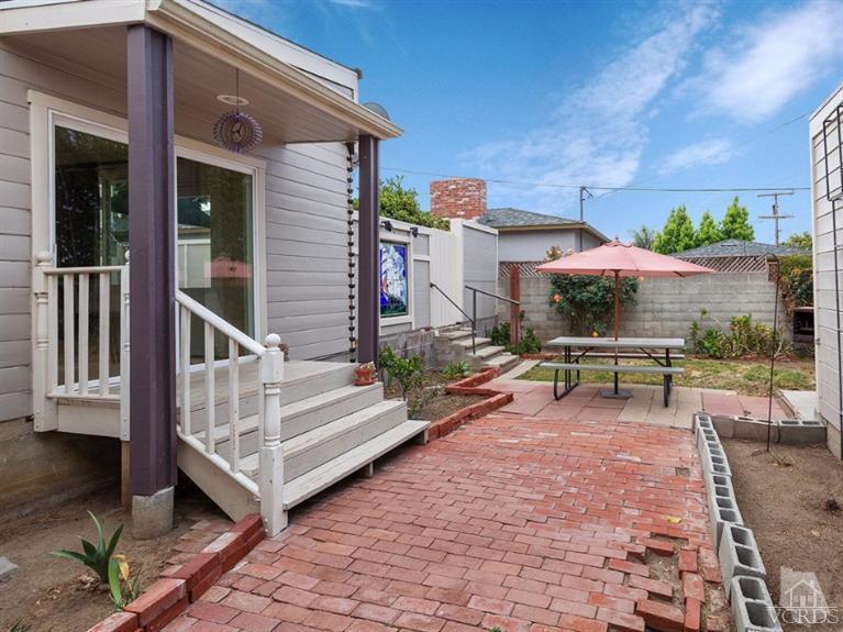 2542 Poli Street Ventura, CA 93003 - Photo 8 of 14 a view of a house with backyard and sitting area