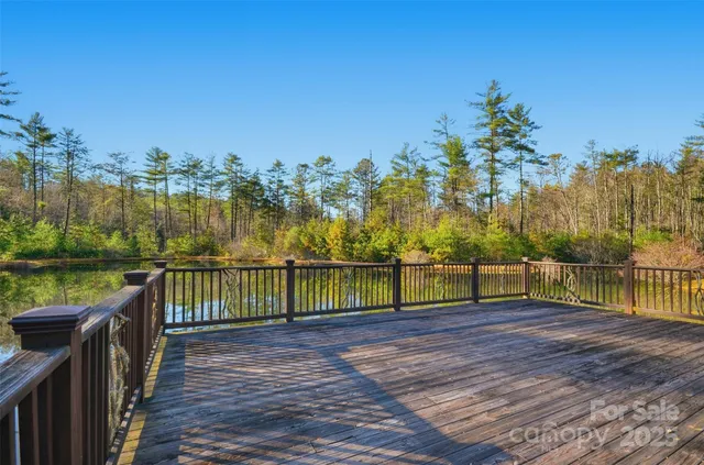 a view of lake with balcony