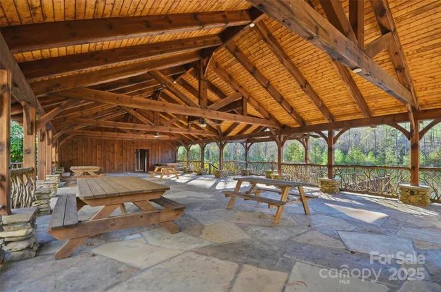 a view of a backyard with sitting area