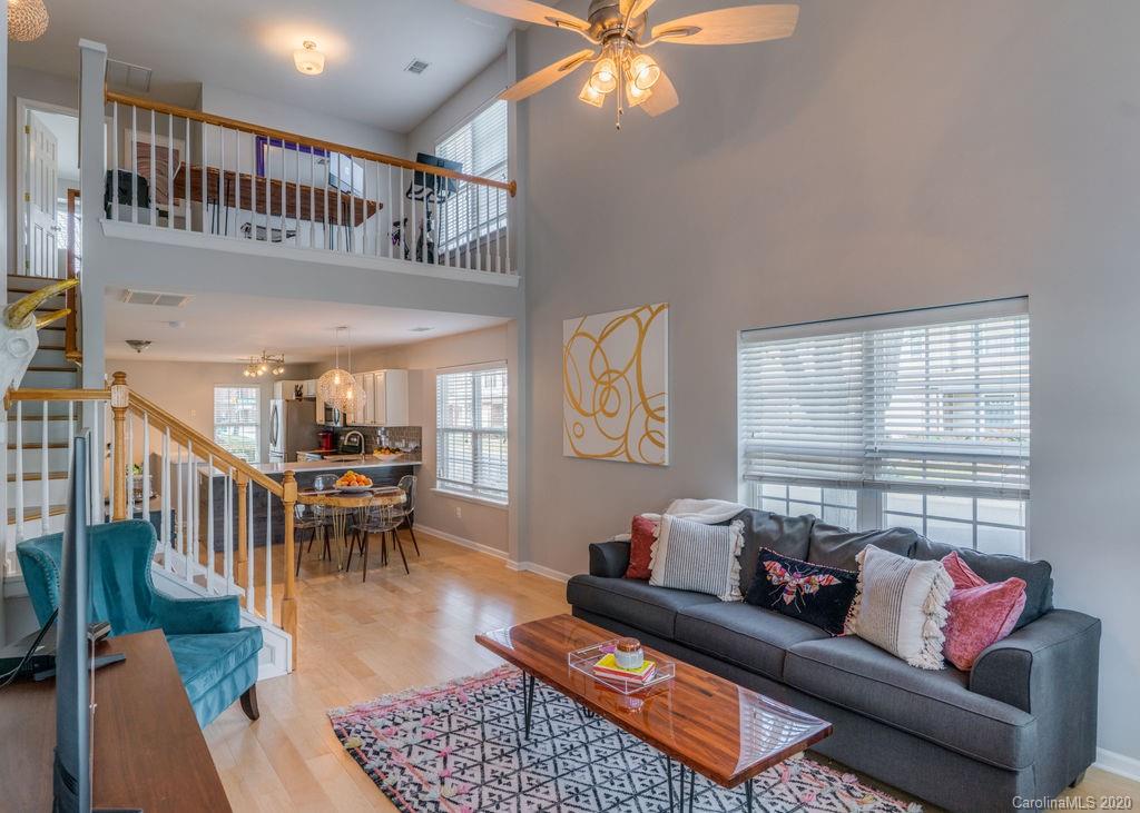 11650 Rabbit Ridge Road, Unit 2071 Charlotte, NC 28270 - Photo 8 of 26 a living room with furniture and a window