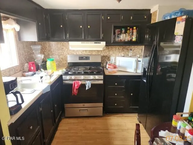 a bathroom with a sink toilet and a shower