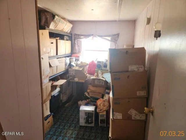 a white toilet sitting next to a bath tub