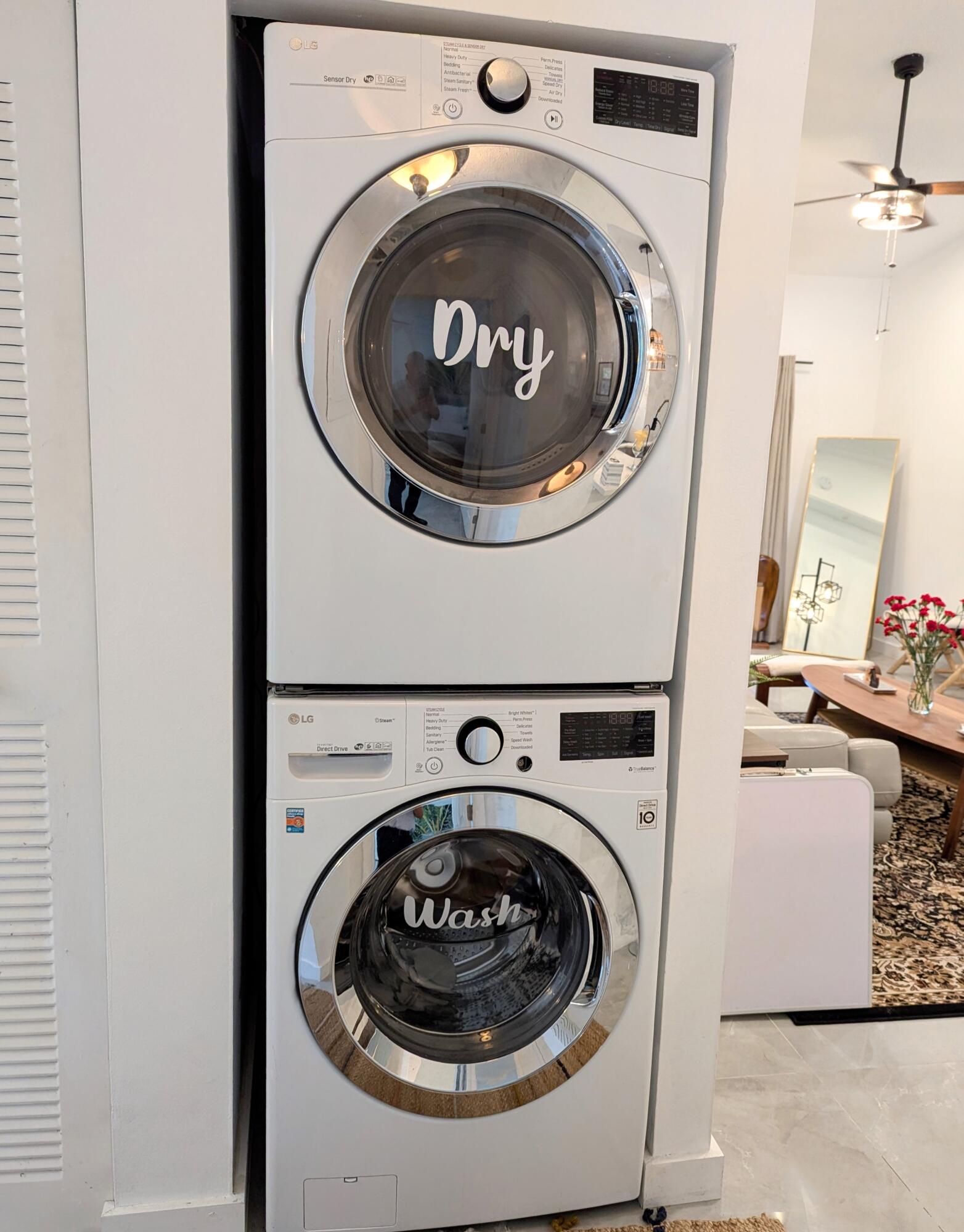 3130 Millwood Terrace, Unit 2160 Boca Raton, FL 33431 - Photo 22 of 34 a utility room with dryer and washer