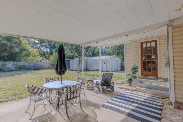 a view of a lake from a porch