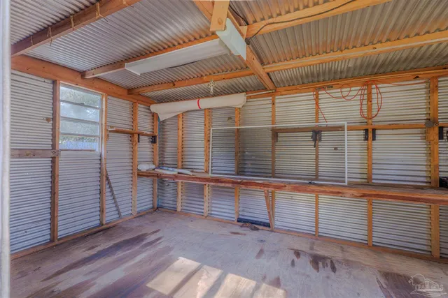 a view of a two chairs in the balcony