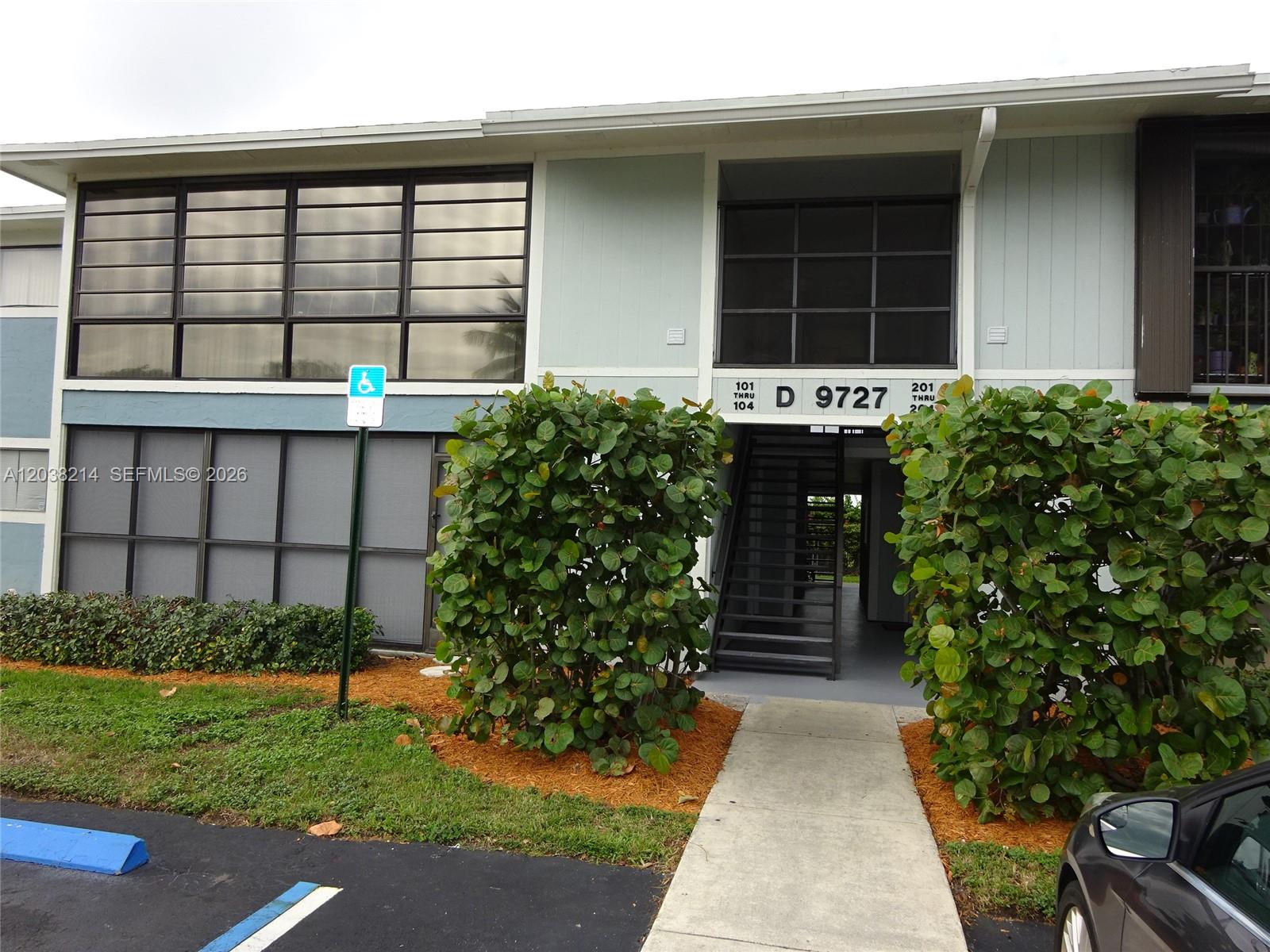 9727 Hammocks Boulevard, Unit 101D Miami, FL 33196 - Photo 6 of 12 front view of a house