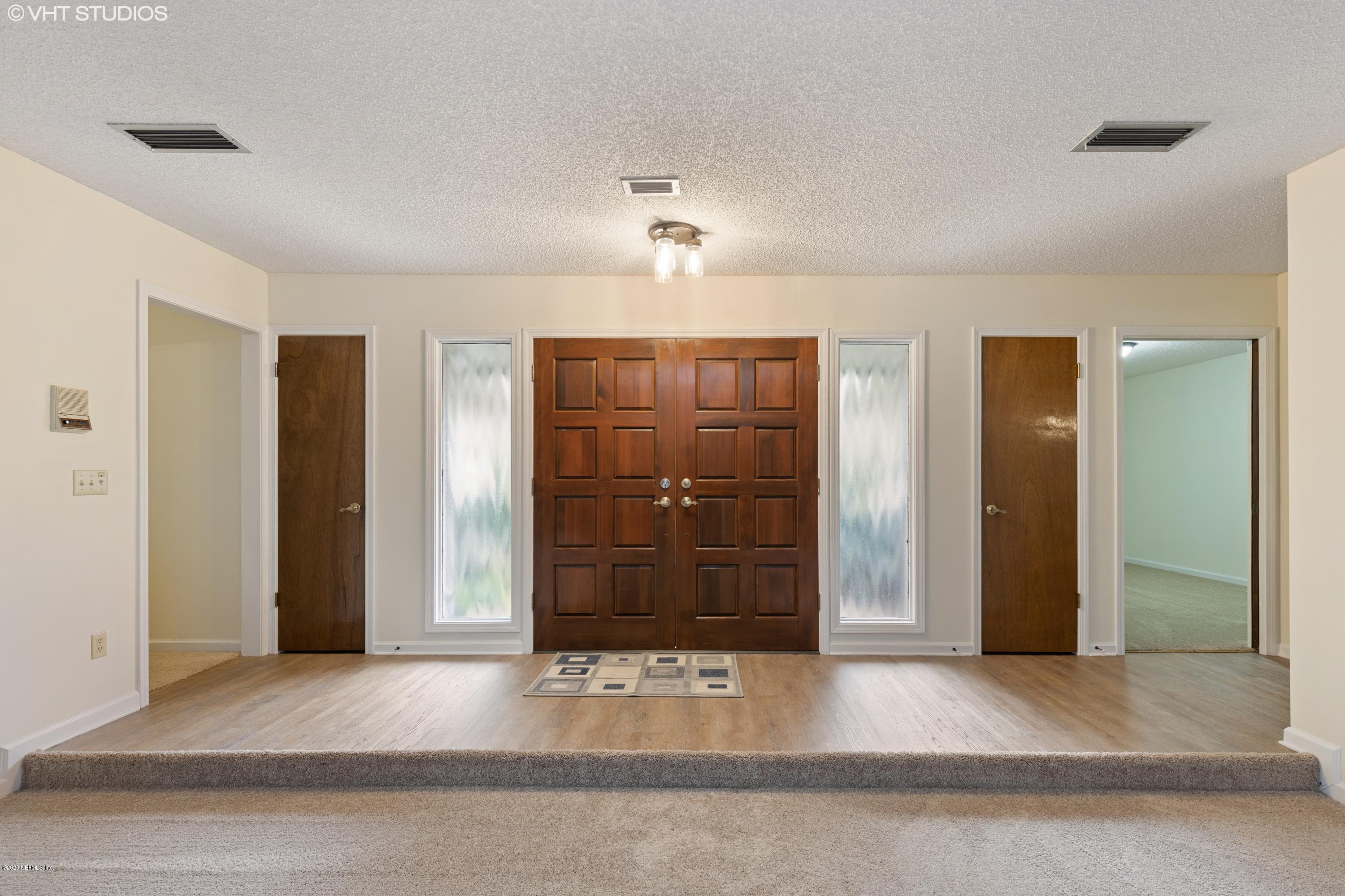 6130 Carlton Road Jacksonville, FL 32244 - Photo 3 of 37 a view of a hallway with closet area