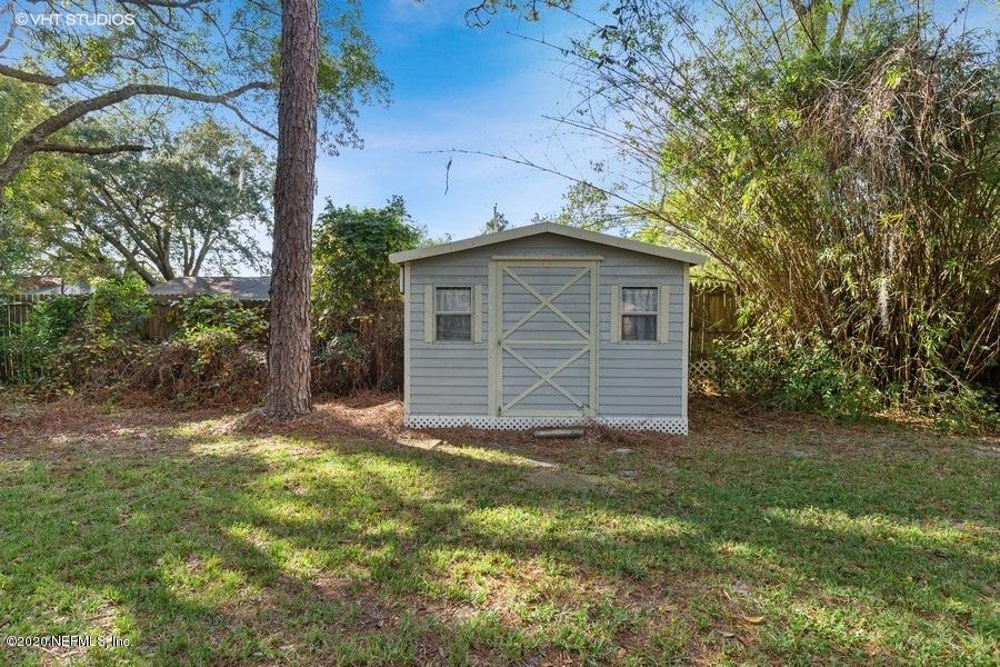 6130 Carlton Road Jacksonville, FL 32244 - Photo 36 of 37 a view of a house with a yard