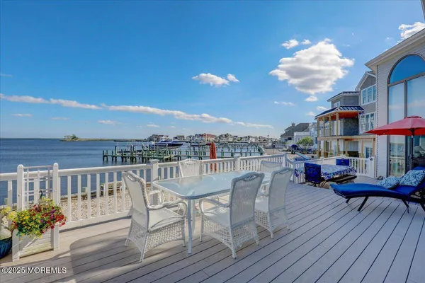 a front view of a house with a yard and a garage