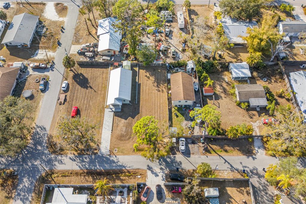 Hand Avenue Sarasota, FL 34232 - Photo 11 of 18 an aerial view of residential houses with outdoor space