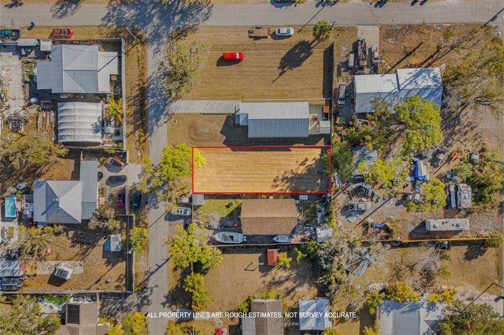 Hand Avenue Sarasota, FL 34232 - Photo 8 of 18 an aerial view of residential houses with outdoor space