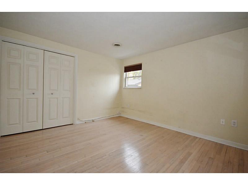 120 Foxcroft Road Pittsburgh, PA 15220 - Photo 12 of 25 Bedroom. 4th bedroom has a full wall of closet space and newer hard wood flooring.