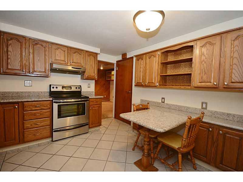 120 Foxcroft Road Pittsburgh, PA 15220 - Photo 14 of 25 Kitchen. Alternate view of EIK with built in table and plenty of cabinet space.
