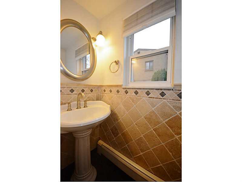 120 Foxcroft Road Pittsburgh, PA 15220 - Photo 15 of 25 Partial Bath. Powder room on main level has been updated with modern ceramic tile.