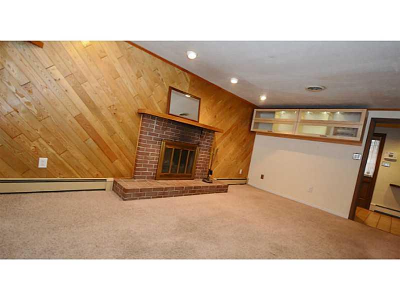 120 Foxcroft Road Pittsburgh, PA 15220 - Photo 4 of 25 Family Room. Family Room has a rustic feel with a paneled wall, gas fireplace to keep you warm all winter & built in wine storage.