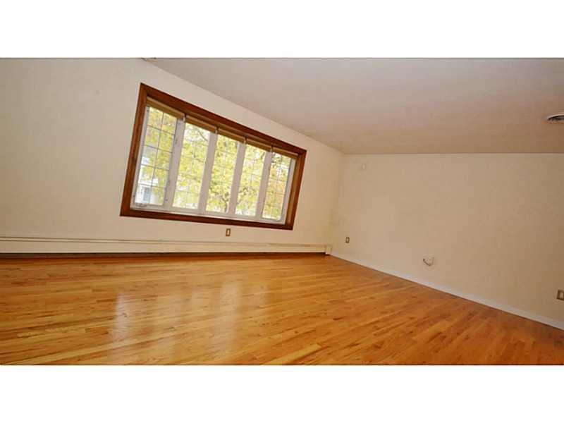 120 Foxcroft Road Pittsburgh, PA 15220 - Photo 6 of 25 Living Room. Living room has tons of natural light and HW floors.