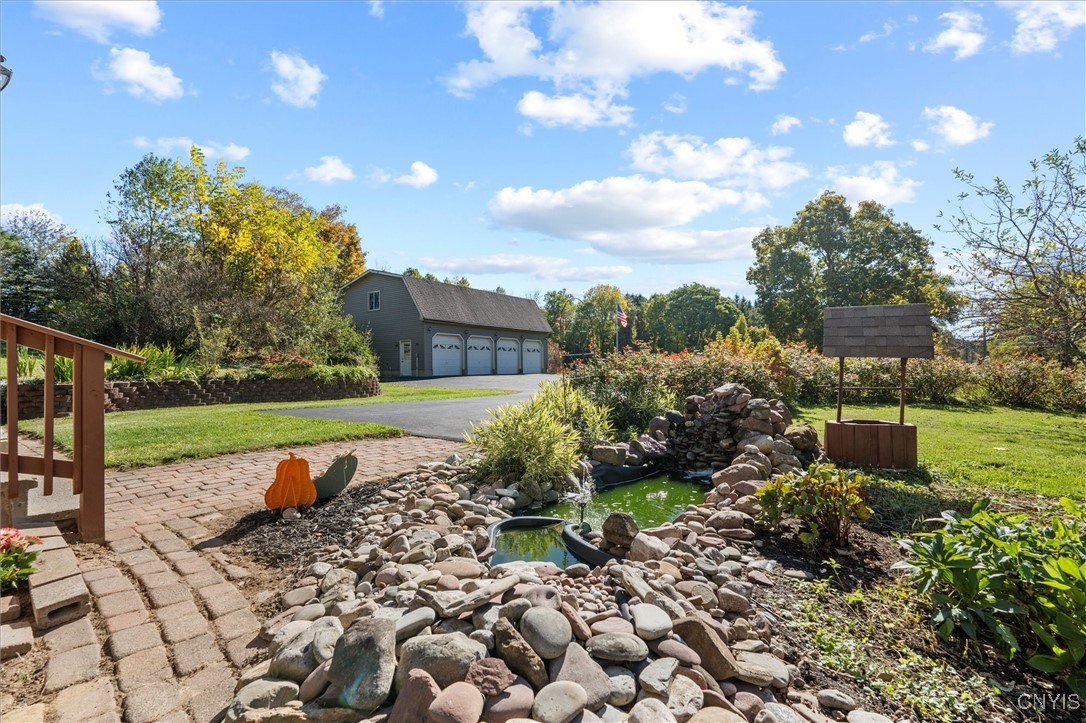 988 County Rte 14 Granby, NY 13069 - Photo 37 of 47 Garden pond w/ fountain